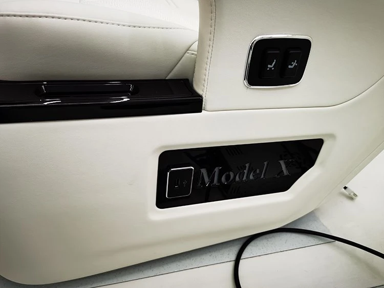 Tesla Model X seat A has buttons on the side